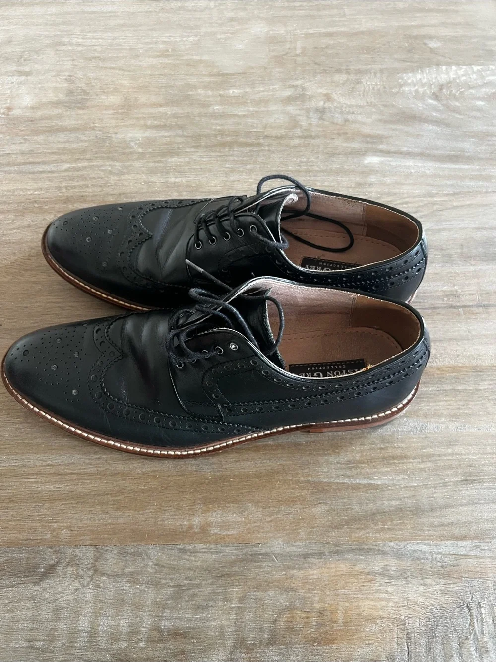 Classic Black Leather Wingtip Oxfords with Contrast Welt